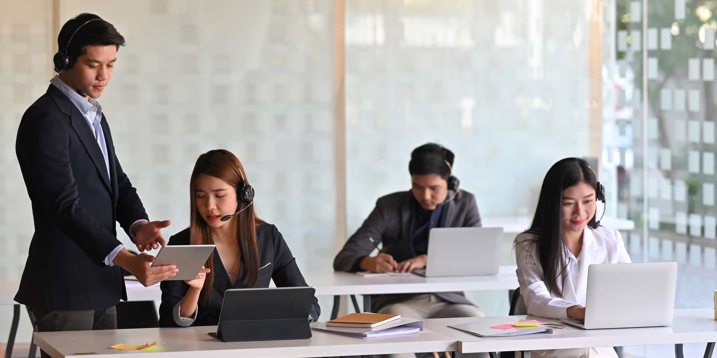 Call Center Team Working Together Answering Calls